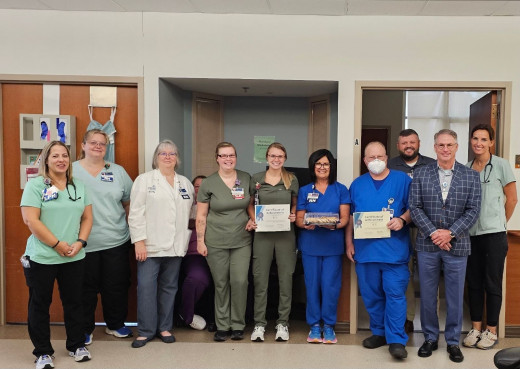 CNRV PCU staff pose with Infection Preventionist Becky Conley, Nursing Director Chris Scott  and CNRV CEO Bill Flattery.