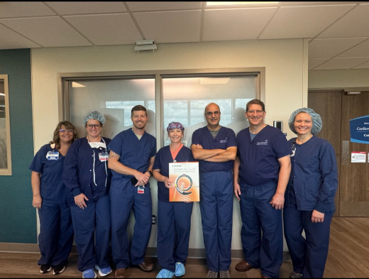 Dr. Mirza, Dr. Kelley, CRMH Cath Lab Team Members
