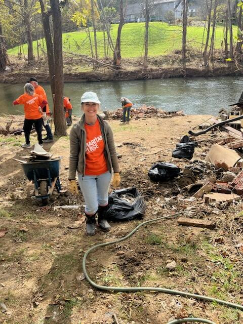 Judy Sadowski cleaning up debris