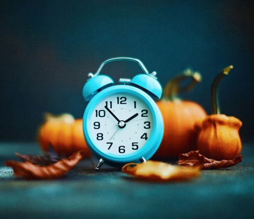 clock and pumpkins