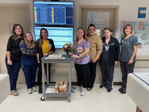 6 West team honoring Belle with her Bee Award.