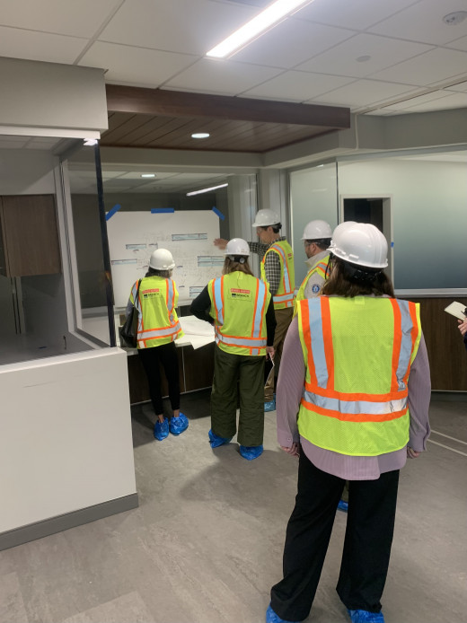 Lobby signage overview with team members