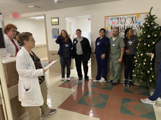 IP presenting HAI free certificate to 8M PCU staff and manager