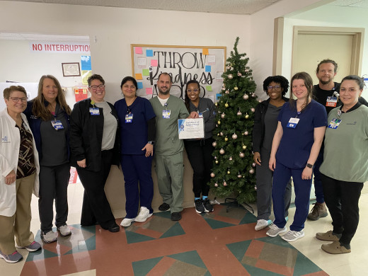 Infection Preventionist, Maribeth Greenway and 8M PCU staff and manager