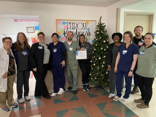 Infection Preventionist, Maribeth Greenway and 8M PCU staff and manager