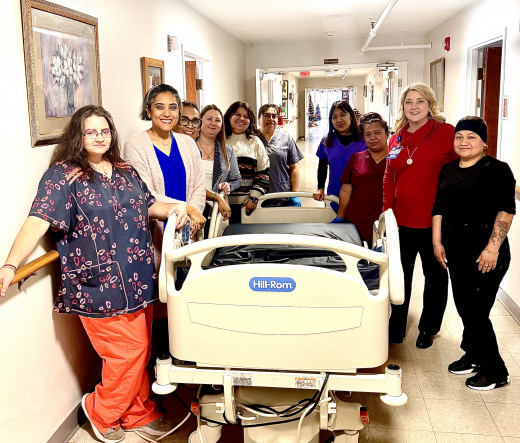 Dr. Remedy Iguaran and Red Oak Staff so appreciative to receive beds for their residents from Carilion Franklin Memorial