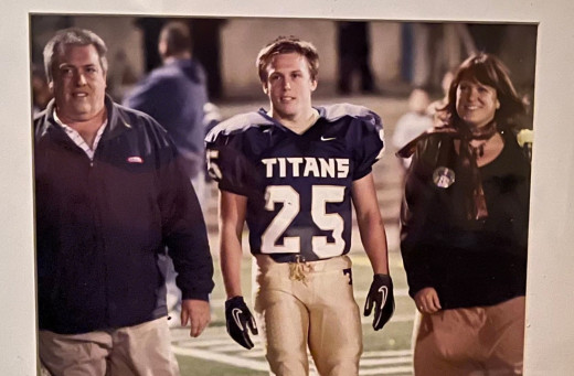 Jimmy Howe and his parents