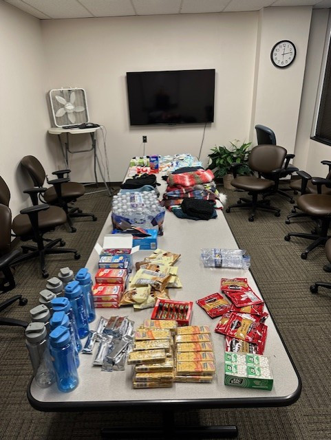 Supplies gathered to pack bags.