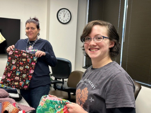 Team members packing bags.