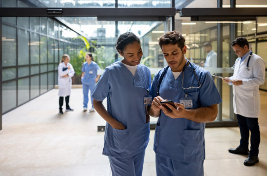 Two nurses with a cell phone