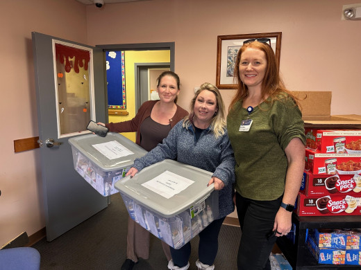 Mandy Swann and PCC staff receiving cold relief packs