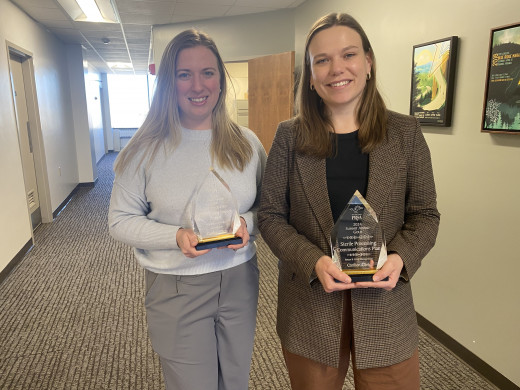 Kelsey Sims and Hannah Curtis with their gold Summit Awards.