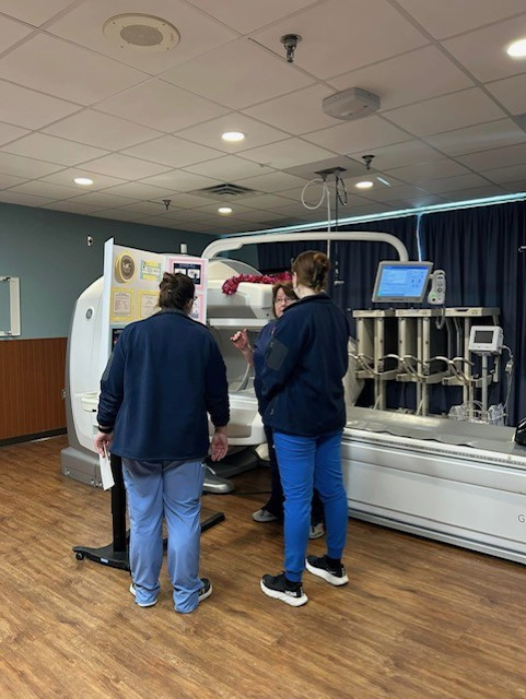 Heather giving a tour of our Nuclear Medicine suite