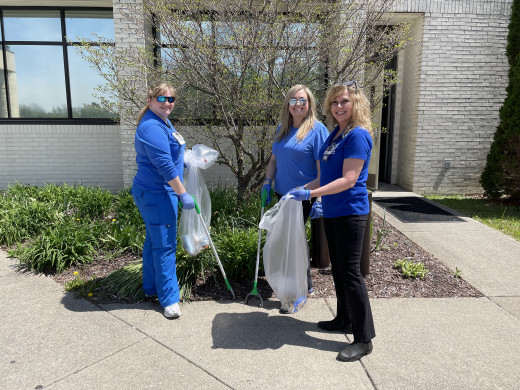 Staff cleaning up on Earth Day