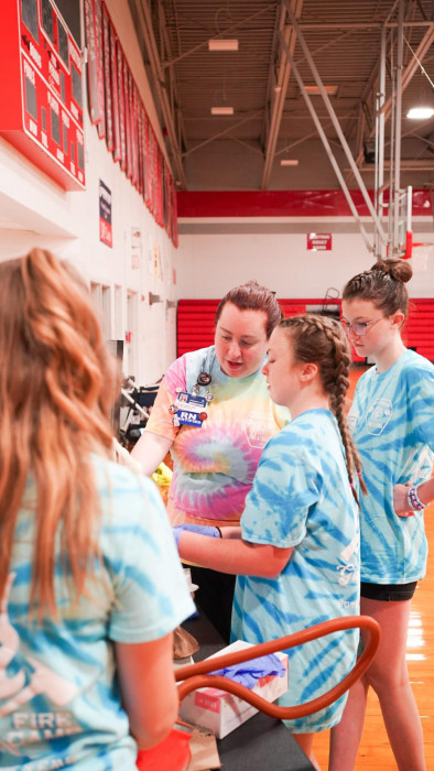 CRMH Outreach Coordinator, Ottilia Lewis (RN), teaching about inhalation injuries at the Botetourt Girls Fire Camp