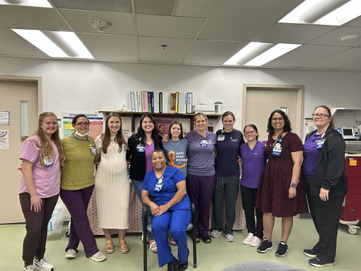 Lesley with some of her Peds co-workers who helped make her day special!