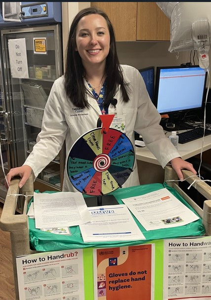 Summer Tomlin playing Wheel of Fortune with CRBH staff
