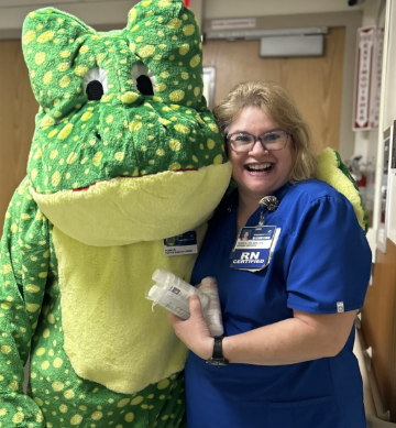 CFMH staff and Franklin the FROG