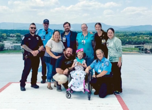 Meg Burrow and care team on helipad