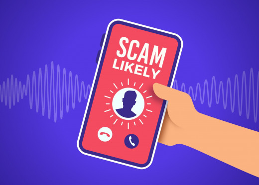 phone with the words "scam likely"