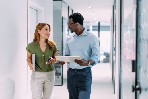 Two coworkers talking