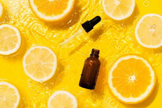 Vitamin C serum and lemons