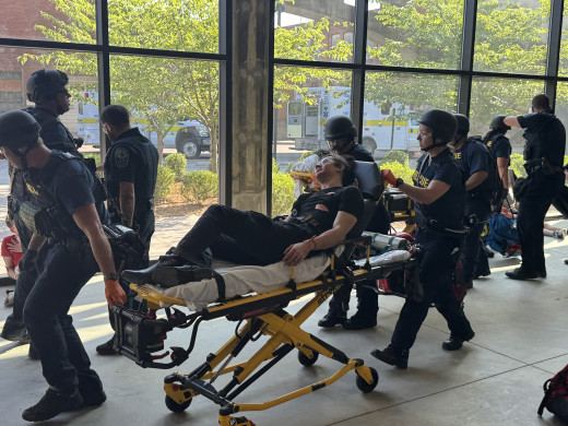 Roanoke EMS evacuating patients based on Roanoke Police officers prioritization