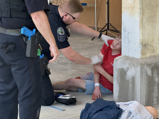 Roanoke County Police triaging and treating simulated gunshot victims as part of the RTF training