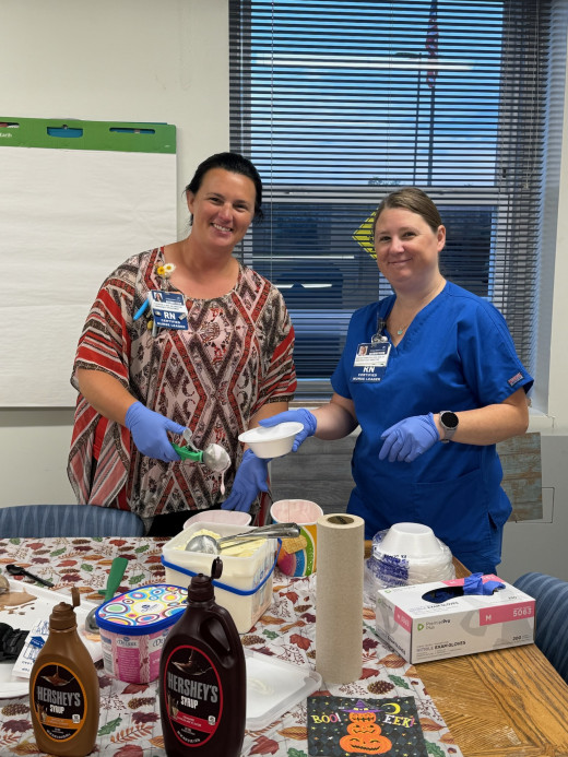 Unit Directors Stephanie (ED) & Amanda (ACS) serving ice cream