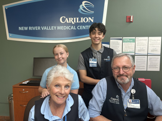 From left front: Cathy, Tony and volunteers Ryder and Meredith