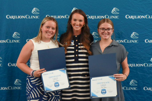 Teagan Burrow and Sadie Geary with their leader,  Macy Deal