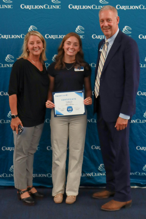 Kailey Grace McCown with their leaders Carl Cline and Tracy McCown