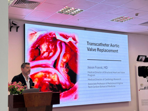 Dr. Foerst at a podium at a conference