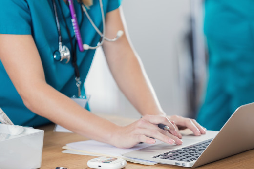 nurse on computer