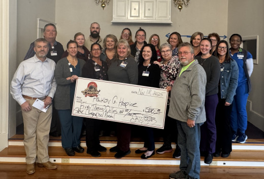 Franklin Hospice Team receiving a check from the Franklin County Car Show.