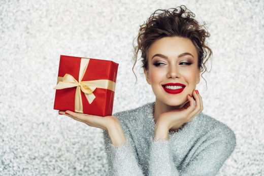 Woman holding holiday package