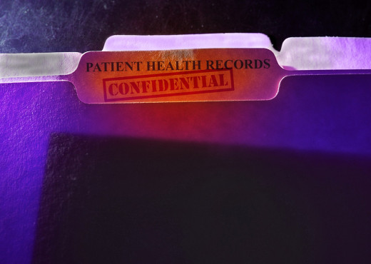folder with the words "patient health records confidential"