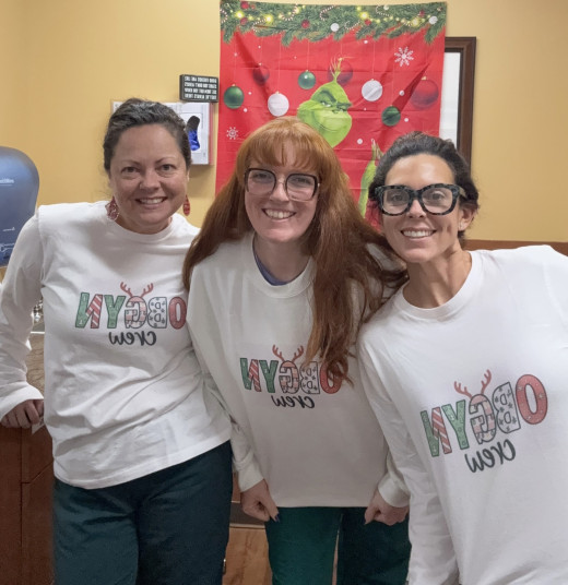 A group of smiling coworkers coming together in matching shirts reflect teamwork, dedication and the heart behind what we do everyday. It's a reminder that great work happens when people support and uplift one another.  Happy Holidays from the SALEM OBGYN Crew! 