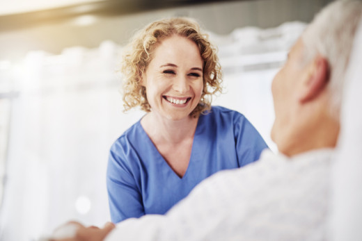 Nurse comforting patient