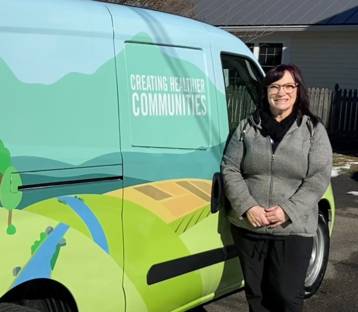 Jillian Smith standing next to the mobile unit