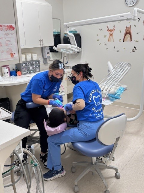 Residents and assistants taking care of our patients.