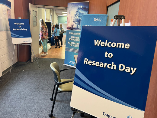welcome to research day sign at the door 