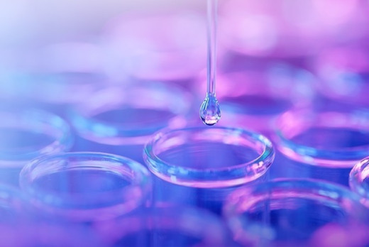 test tubes against a purple background