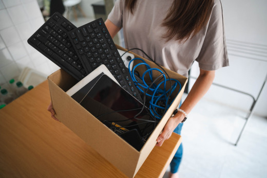 Woman with box of items