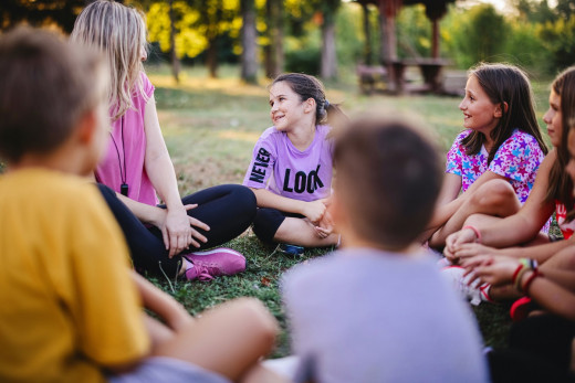 children attending camp outdoors