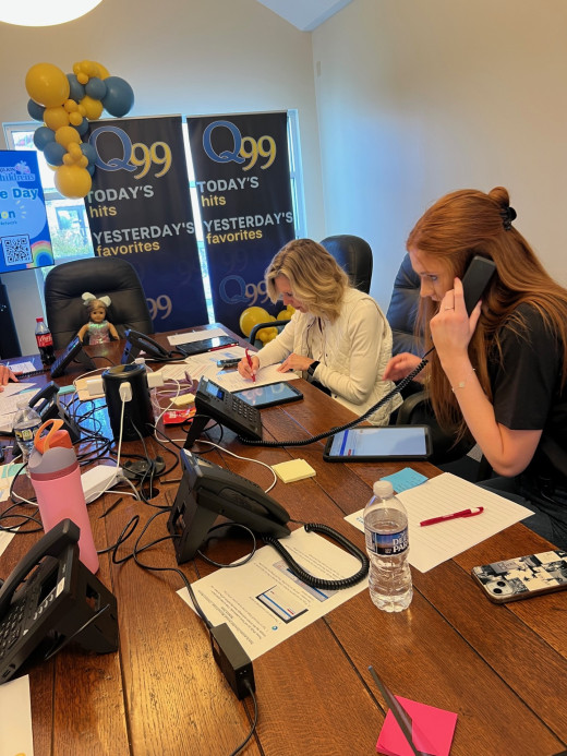 Staff answer phones for callers pledging support and sharing encouraging messages