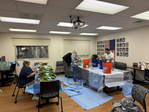 Volunteers helping prepare the tree seedlings 