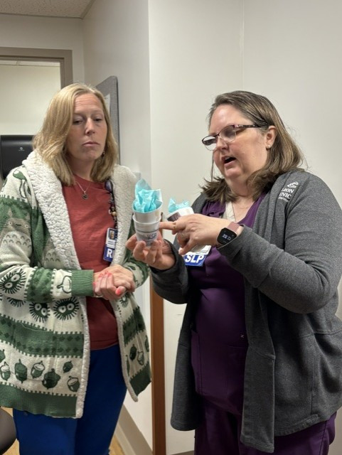 Jena reviewing the process with nursing