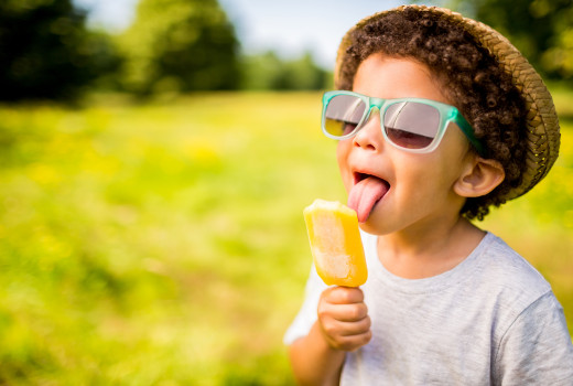 boy eating a popsicle
