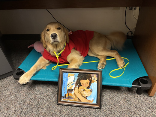 Meadow posing with the beautiful art!